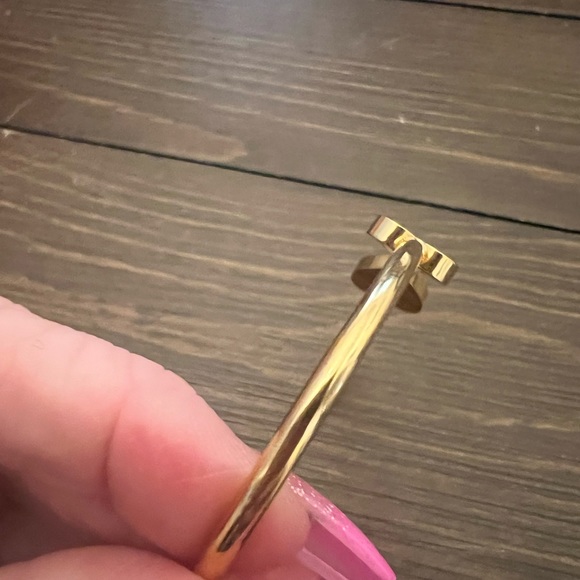 GOLD STAINLESS STEEL ADJUSTABLE BANGLE ACCENTED WITH HEART AND CRYSTALS - Picture 3 of 6